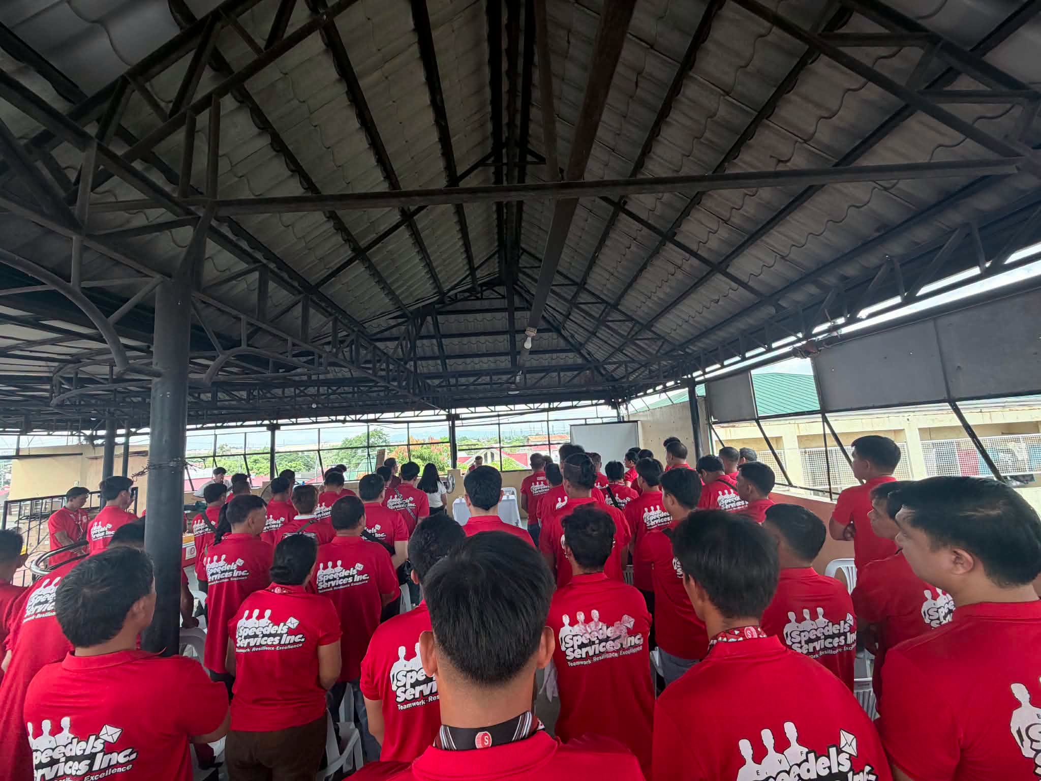 SPEEDels employees gathered during company Mass